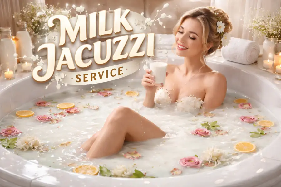 Milk jacuzzi bath with flowers and citrus slices