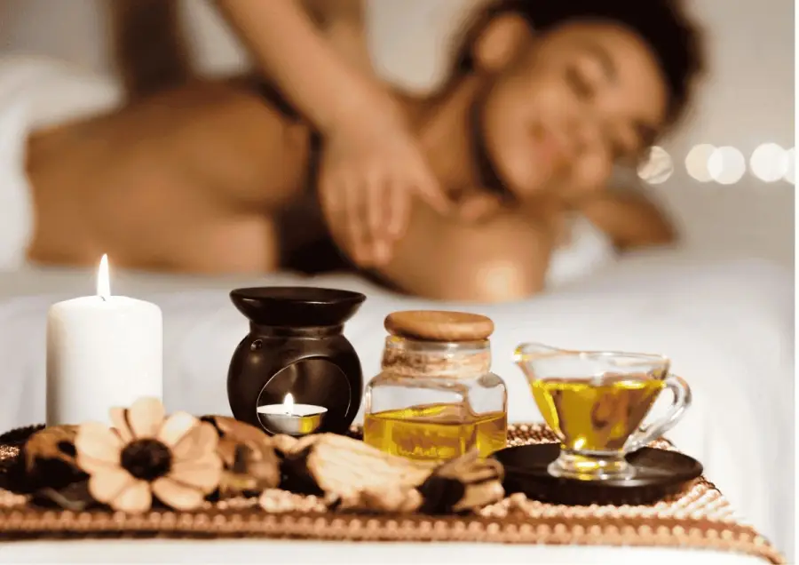 Aroma therapy massage with candles and essential oils