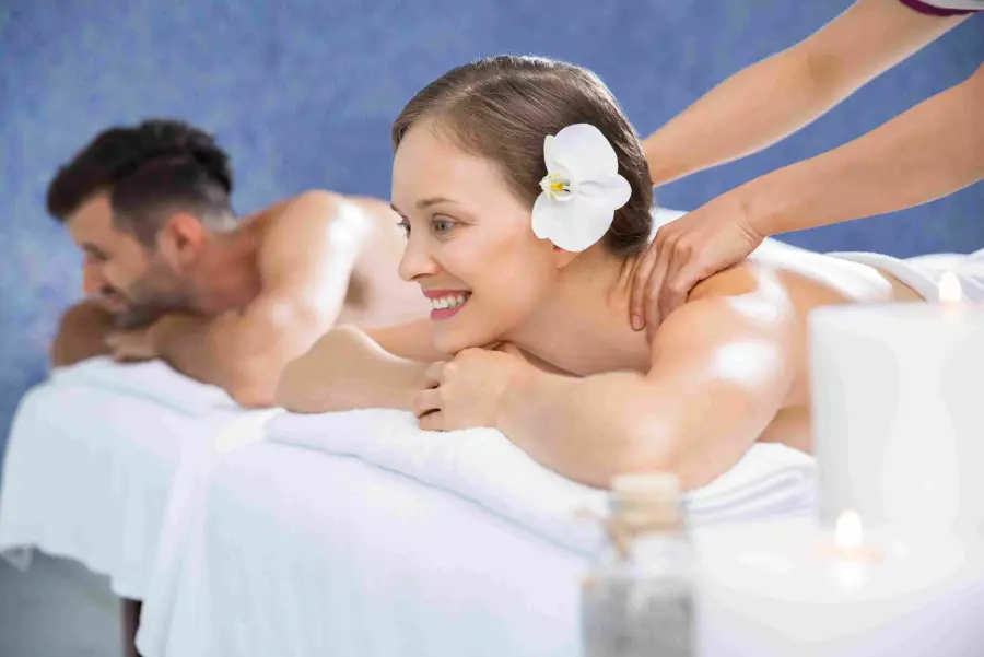Couple relaxing side by side during a massage